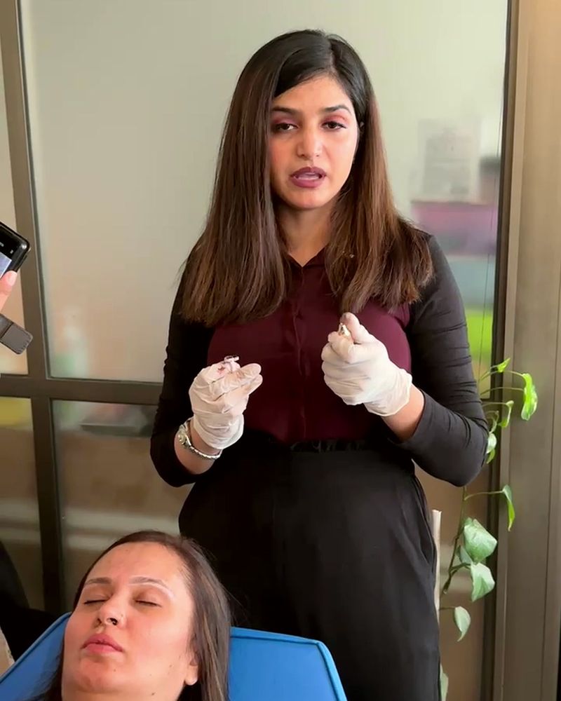 Mehak Ishtiaq explaining a procedure to participants