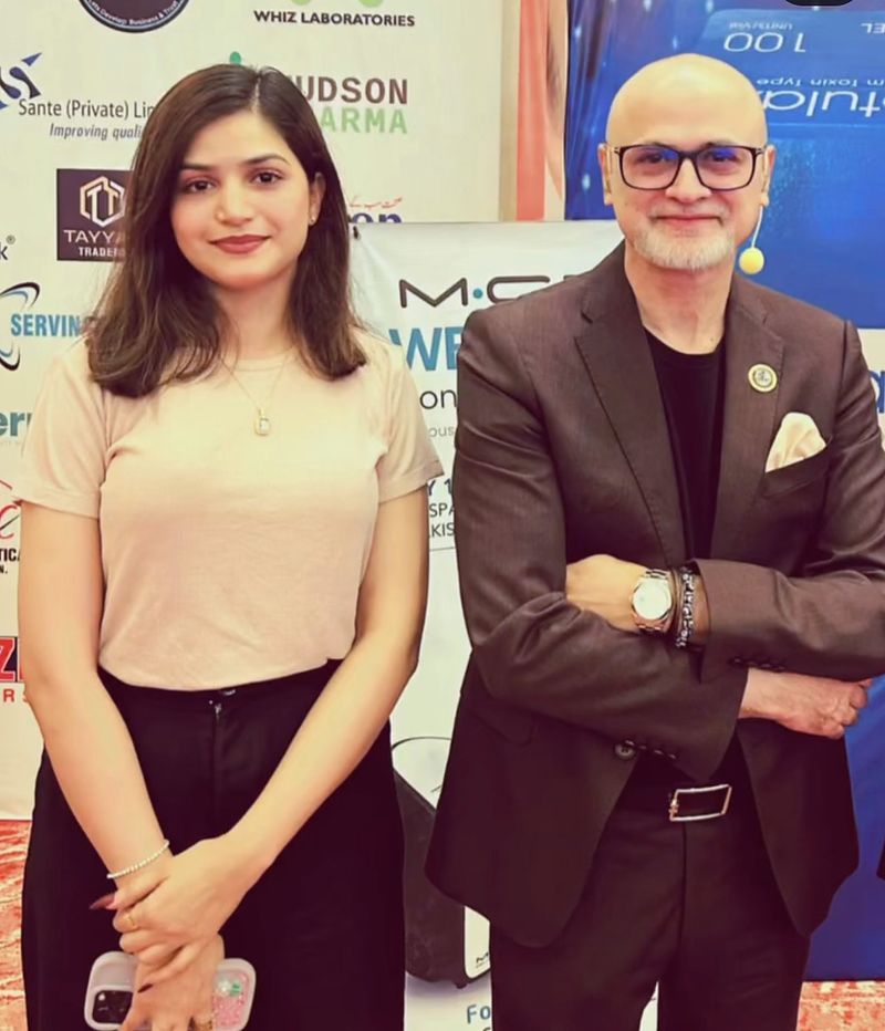 Mehak Ishtiaq and Dr Haroon Nabi standing together at IPAAC 2026, Pearl-Continental Lahore